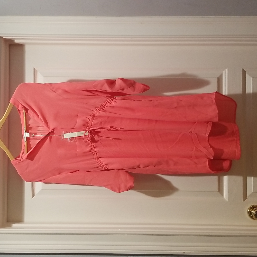 Lauren Conrad salmon-colored dress with pockets